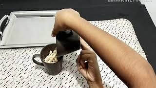 Pouring grain from jug to jug- EPL-2-3 yrs