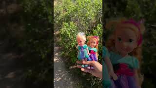 Elsa and Anna go for a walk in the woods near the sea