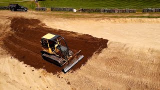 Grading And Top Dressing The Backside Of The Dam