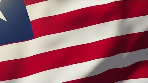 4K Liberia flag waving in the wind. Looping sun rises style. Animation loop Stock video