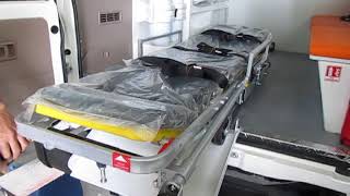 Loading Of Roll-In Cot Chair New Cavalier In Toyota Land Cruiser Hardtop Ambulance