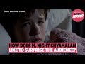 How does M. Night Shyamalan like to surprise the audience?