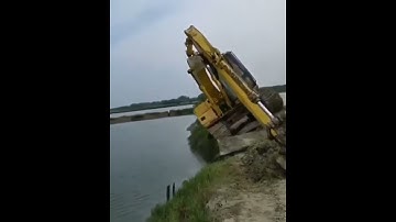 excavator falls in the river FAIL #shorts