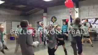 Cubs playing balloon volleyball