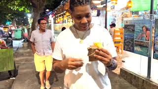 Trying street food in Colombia