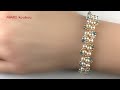 Gold and silver combination bracelet with seed beads