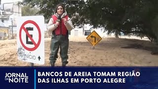 Bancos de areia invadem ruas e casas em Porto Alegre após cheia