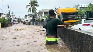 Walking Caro lalo river overflow into houses Mauritius rain cyclone Belal
