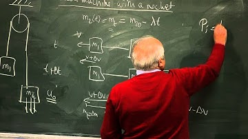 Atwood machine with a rocket: a variable mass problem