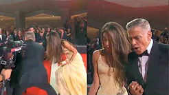 George Clooney assists fallen photographer at Venice Film Festival premiere thumbnail