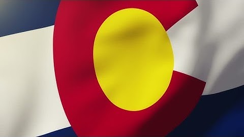 4K colorado flag waving in the wind. Looping sun rises style. Animation loop Stock video