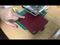 合皮の素材の製品押し（型押し）加工の試し押し。