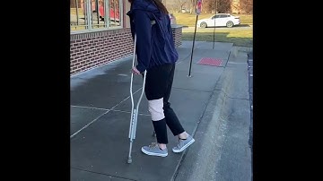 Stepping onto a Curb using Crutches - Omaha Physical Therapy Institute