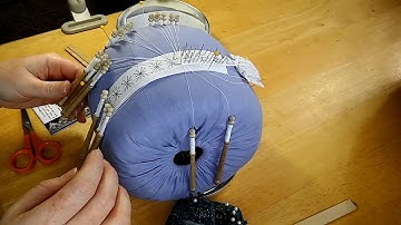 Replacing a bobbin in bobbin lace