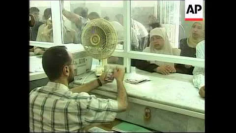 People queuing up to collect salaries from Hamas