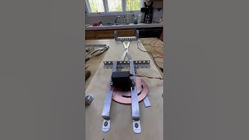 HO scale double crossover underside view.