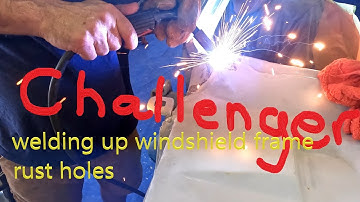 Challenger welding up windshield frame rust holes