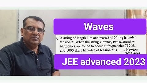 A string of length 1 m and mass 2 × 10−5 kg is under tension T. When the string vibrates, two