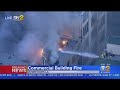 Multiple Explosions As Blaze Engulfs Century-Old Commercial Building In Downtown LA