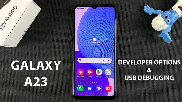 How do I enable USB debugging and developer options on iPhone?