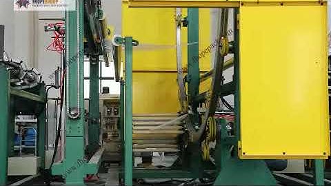 Giant horizontal orbital stretch wrapping machine with film covering unit