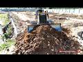 Powerful Landfill Into Beam Spacing Using Skills Bulldozer pushing soil with Dump truck dumping soil