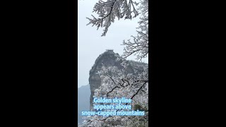 Golden skyline appears after snow at Tianmen Mountain, China