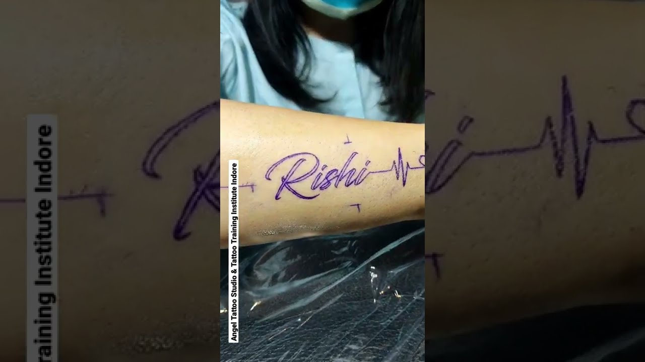 Flute with name tattoo Artist : D.Rajput @hamsatattoostudio @evathemall  #manjalpur #nametattoos #flutetattoo #tattooselection #tattooartist  #barodacity... | By HAMSA Tattoo StudioFacebook