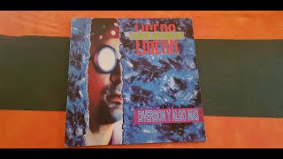 ALEACION LIGERA.''DIVERSION....Y ALGO MAS.''.(OJOS DE SOL.)(12'' LP.)(1990.)