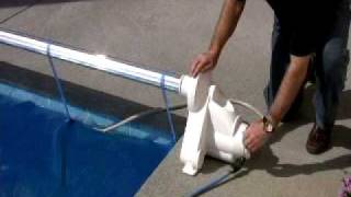 The Auto Reel: An automatic pool cover roller 