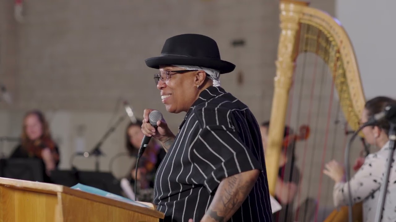 Bleu reading her poem 