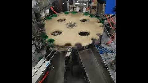 Cap wadding machine two heads with caps bowl feeding system