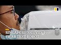 Singapore’s Covid-19 swab test robot helps reduce infection risk for health care workers