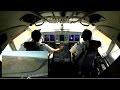 Sukhoi SuperJet 100 landing, dual camera cockpit view.
