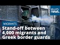 Stand-off between 4,000 migrants and Greek border guards
