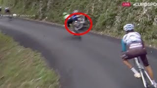 Richie porte's crash on stage 9 descent of 2017 tour de france. video
shows him hit a grass verge and hurtle across the road in front others
riders - comp...