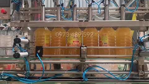 Máy chiết rót dầu ăn tự động chai 3lit đến 10lits