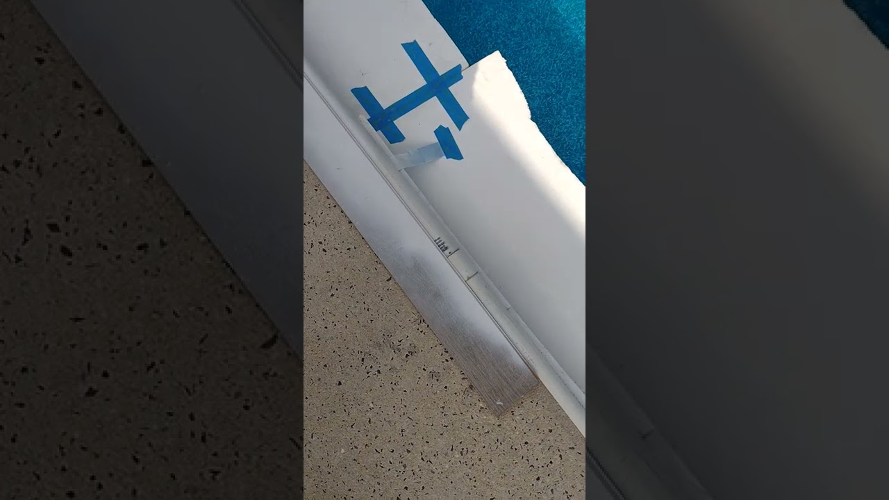 Painting pool coping.
