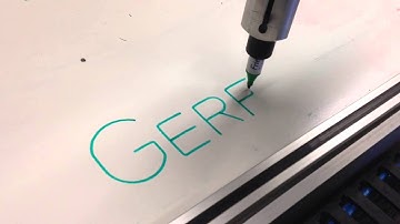 Robot typing my name on a whiteboard