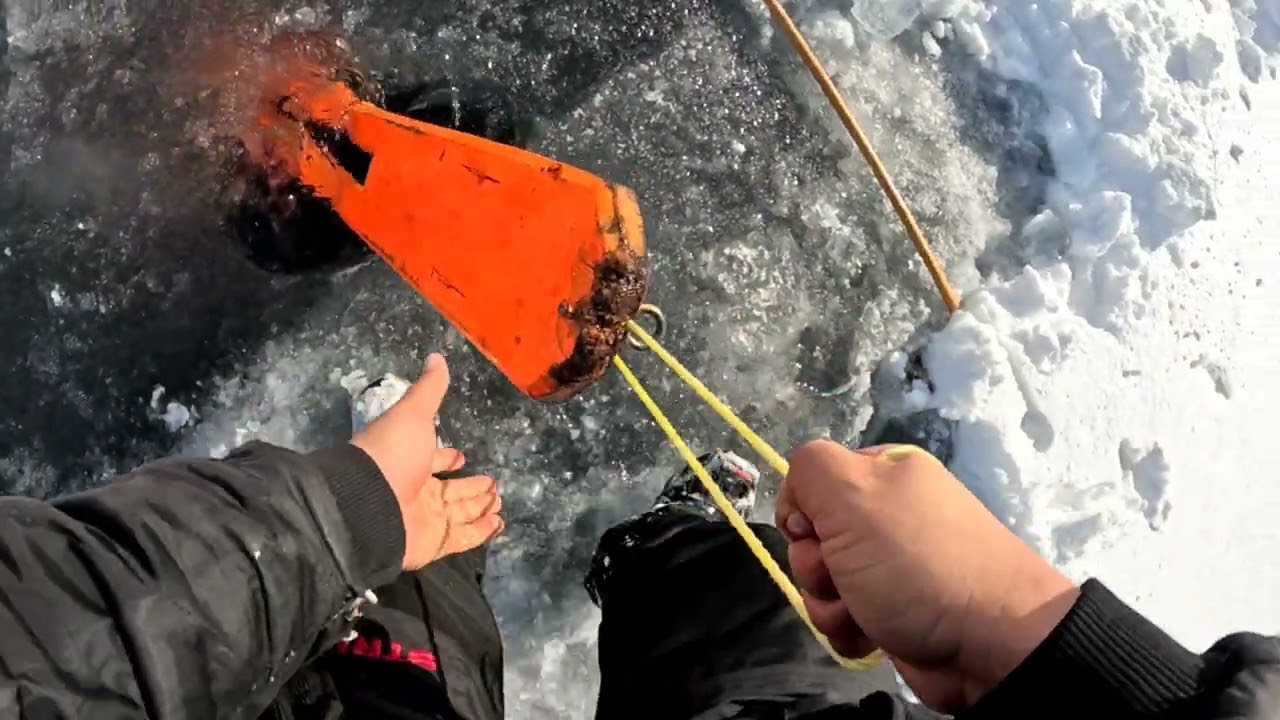 Solo setting a 300ft net under the ice.