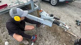 Trailer repair, changing a brake damper on a trailer