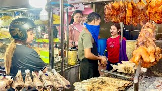 Street food in Phnom Penh at night with lots of delicious food - grilled duck honey, chicken, fish