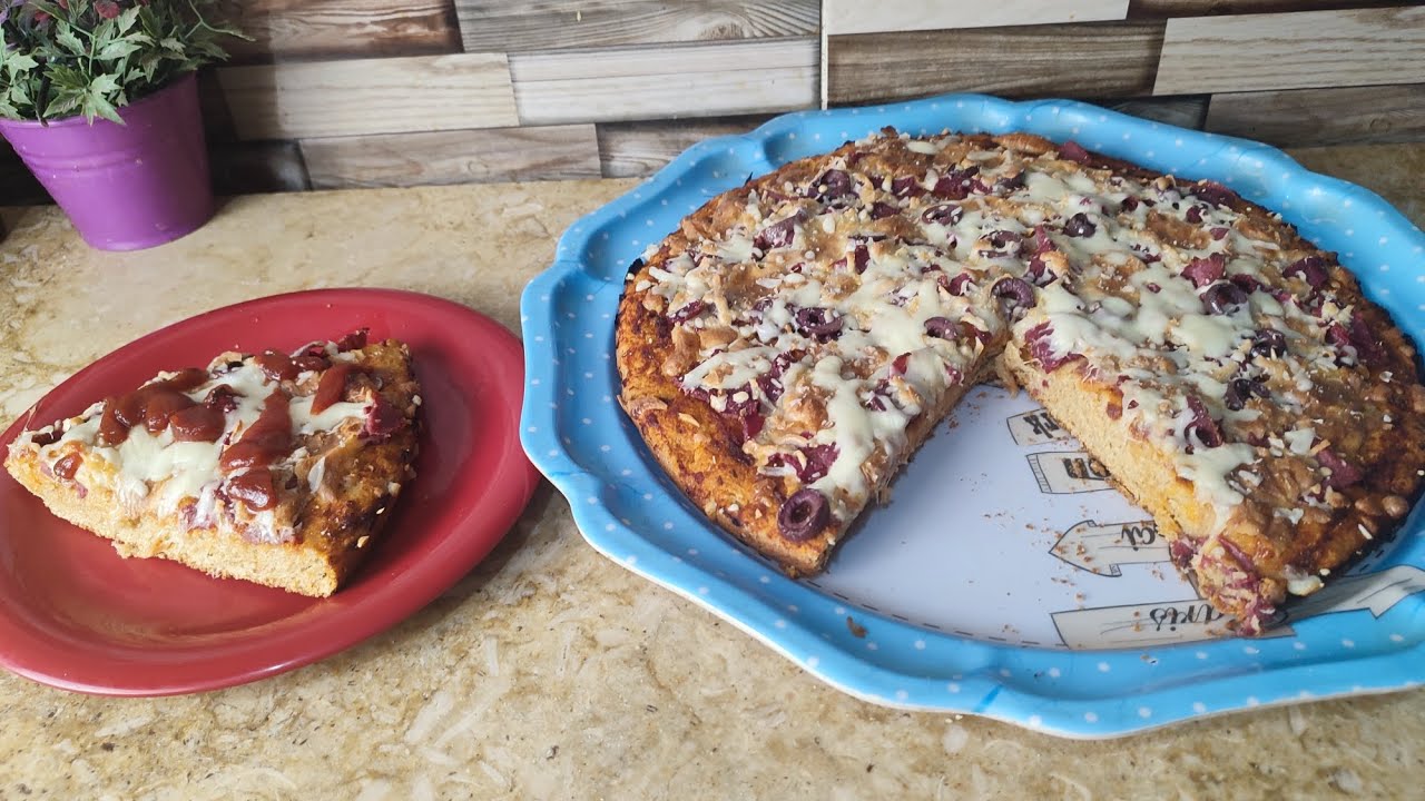 طريقة عمل بيتزا الحبة الكاملة الصحية وطعمه زي البيتزا العادية وازاي تكون هشة من جوه ومقرمشة من بره💪🏻