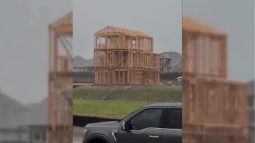 Moment building collapses due to storm winds