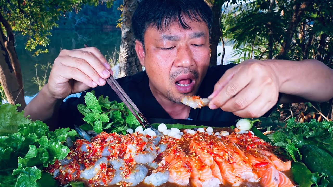 Fresh shrimp and salmon with seafood dipping sauce and fermented fish sauce.