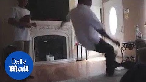 Hilarious moment dad fails at attempt to ride hoverboard - Daily Mail