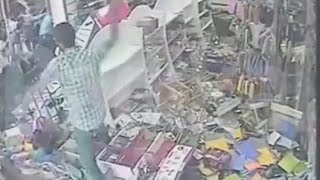 Turkish imperialist scums attack and burn a kurdish shop.