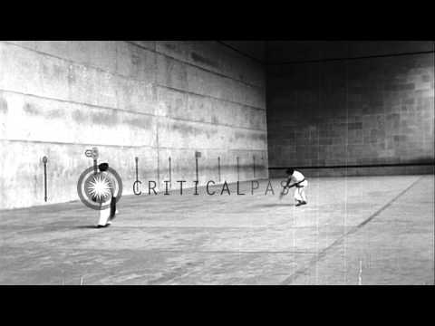 Men play Jai Alai game in Spain HD Stock Footage