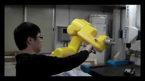 Collision Avoidance of Industrial Robot Arms using an Invisible Sensitive Skin