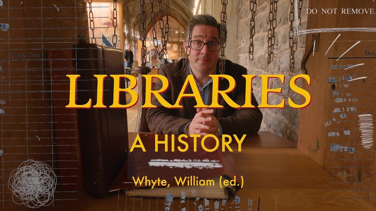 Prof William Whyte sitting in a library